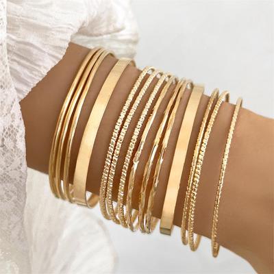 European-American Retro Wide Gold Bracelet Set - Exaggerated, Glossy, Irregular Design, Multi-Piece Collection.