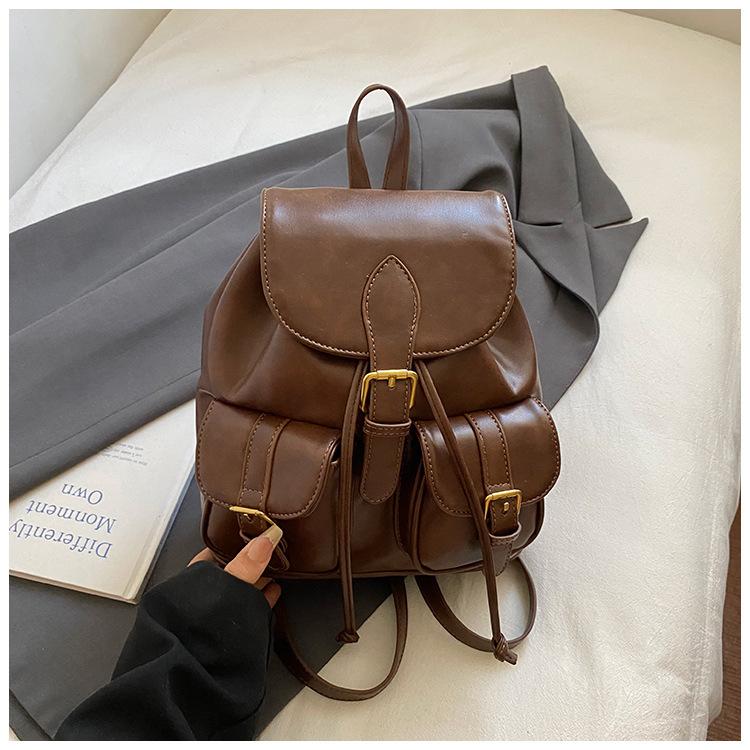 

Модный женский рюкзак для поездок на работу 2025 новый изысканный зарубежный стиль рюкзак в студенческом стиле дорожный маленький школьный рюкзак светло-коричневого