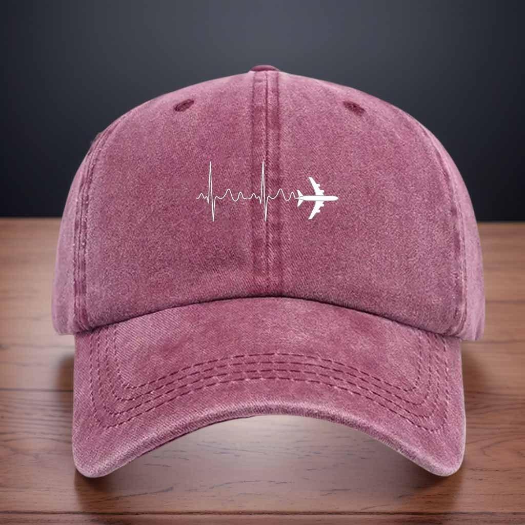 A Baseball Cap with a Printed Simple Line Drawing of an Airplane At the End Suitable for Outdoor Activities Vacations Relaxat