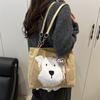 Cute cartoon tote bag women's bag 2025 autumn and winter new fashionable versatile shoulder bag solid color commuter armpit bag