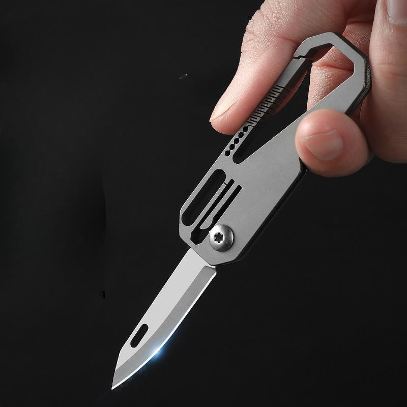 Titanium Knife Multifunctional Keychain Mini Edc Portable Unpacking Knife Sharp Portable Express Small Folding Knife.