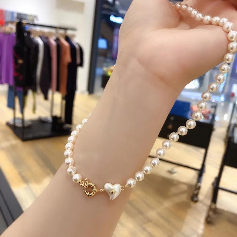 High-End Empress Dowager Heart Necklace and Saturn Bracelet Set