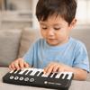Tragbares Design Lernklavier Tastatur 7 Farben LED Musikinstrument Spielzeug Geburtstagsgeschenk