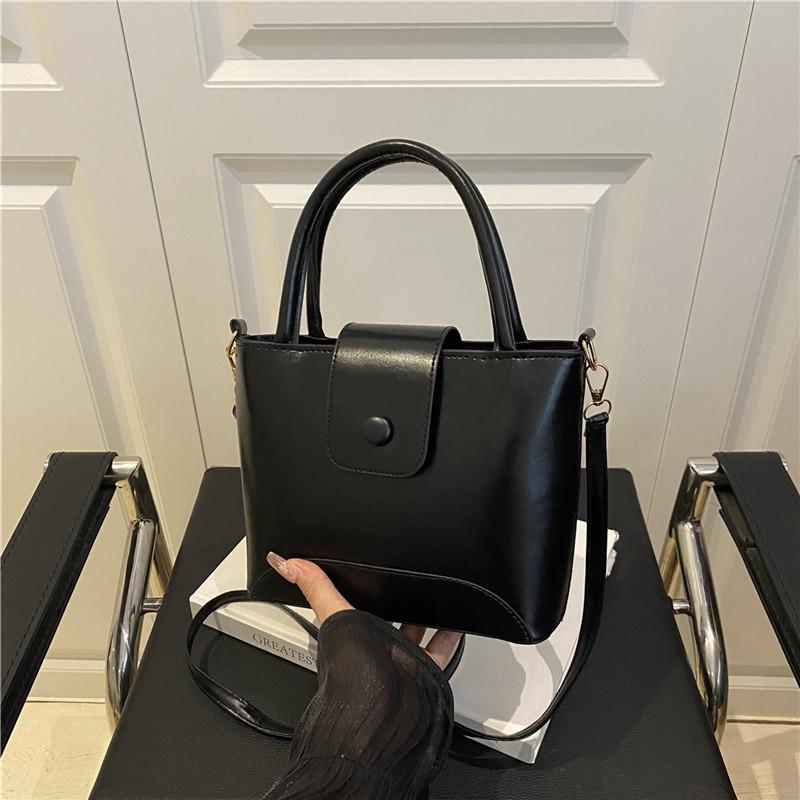 Premium simple niche fashion handbag women's summer new bucket bag single shoulder oblique span women's bag
