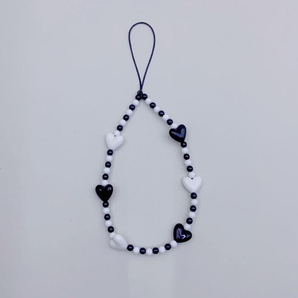 

Xiaohongshu INS black and white love acrylic beads of the same style in Japan and South Korea are fashionable and anti-lost.
