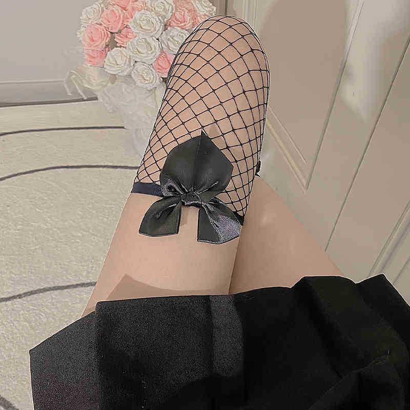 Women's Lace Trim Over-the-Knee Black Stockings with Butterfly Design