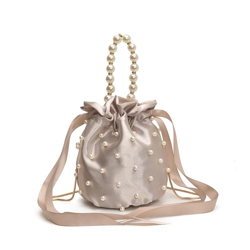 Pearl handbag women's niche design drawstring bucket bag Internet celebrity bridal bag high-end shoulder messenger bag