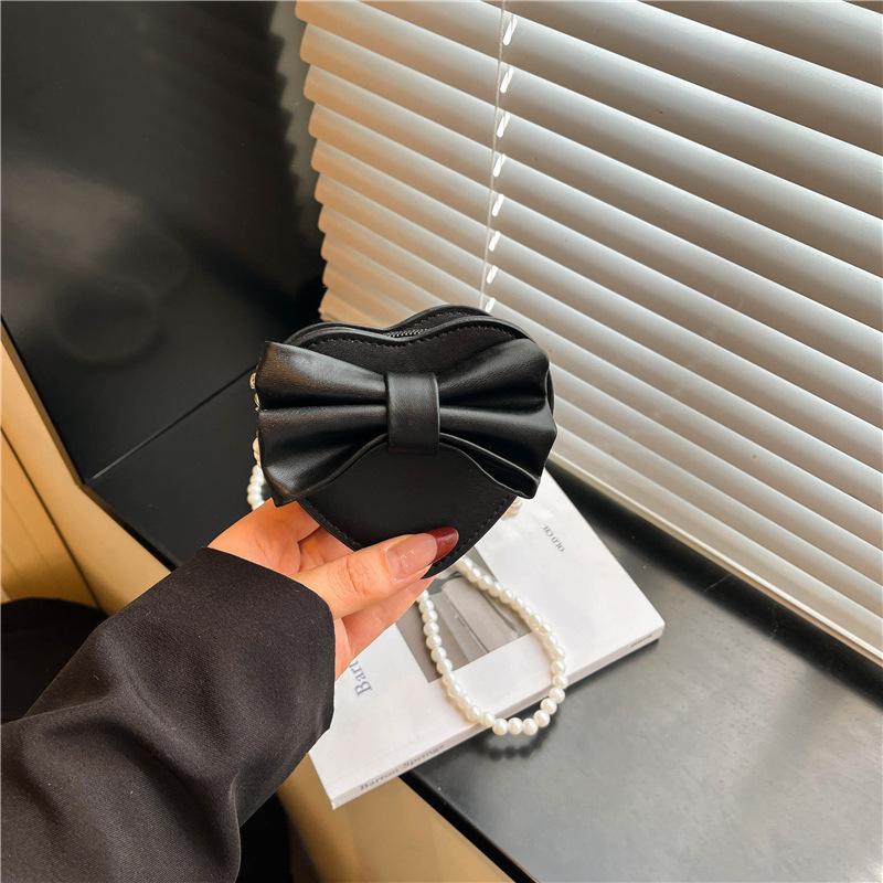 Summer new Korean version heart-shaped bow women's bag small bag foreign style shoulder bag solid color small bag messenger bag women
