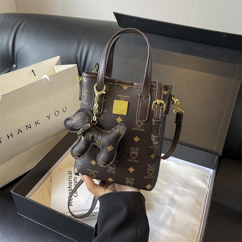 

Season s new fashion trend sheet music small hand shoulder oblique span women s bag