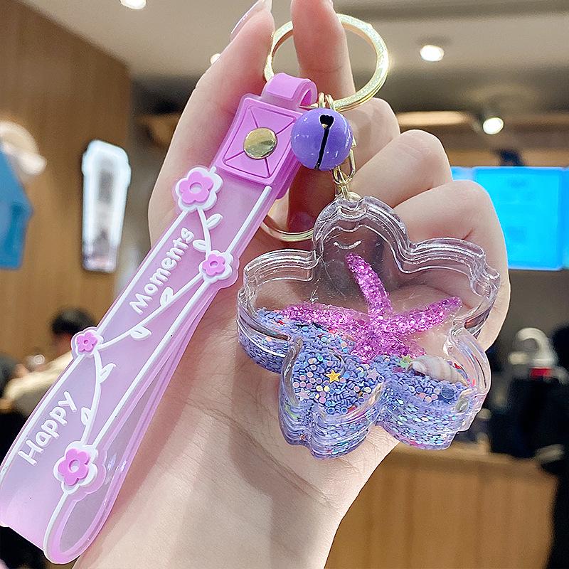 Starfish Quicksand Oil Keychain: Exquisite Pendant for Women's Bags, Students, and Kids - Cute Floating Schoolbag Decoration