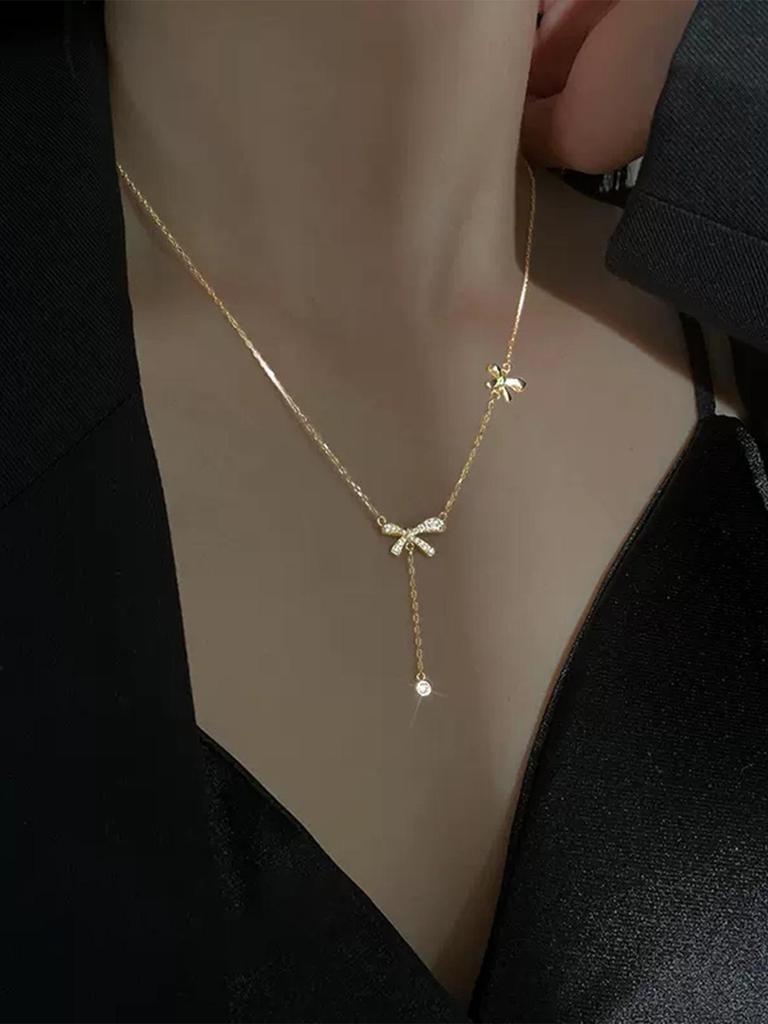 Elegant Japanese & Korean Bow Pendant Necklace: Light Luxury with Tassel for Women