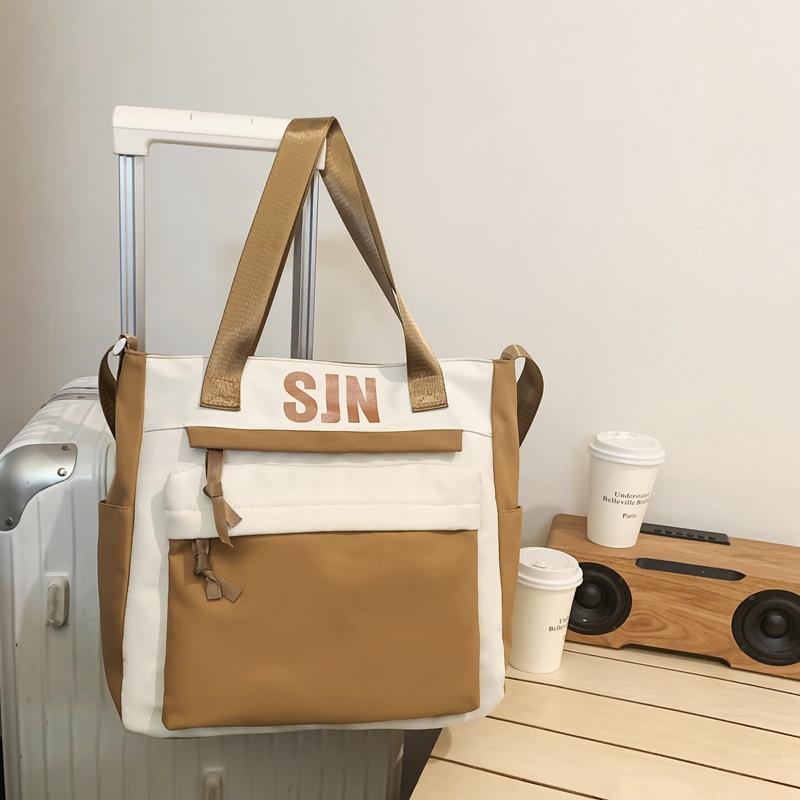 Schoolbag Japanese simple and fashionable backpack 1011 summer new middle school schoolbag college student college style alphabet backpack