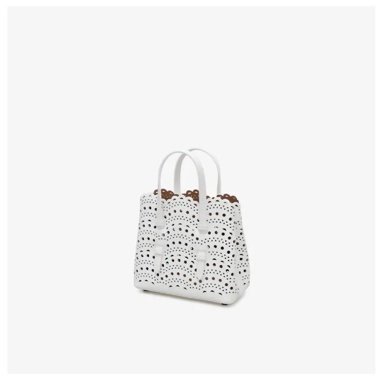 Dámská crossbody kabelka z ručně broušené hovězí kůže, laserově řezaná, z pravé kůže