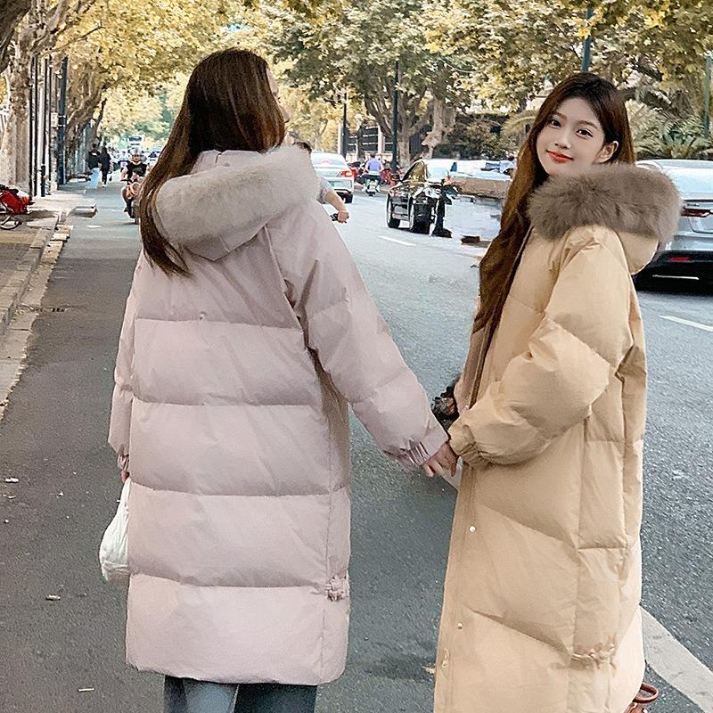 Down cotton-padded clothes, new big fur collar, long knee-length cotton-padded clothes, thickened fashionable winter cotton-padded jacket.