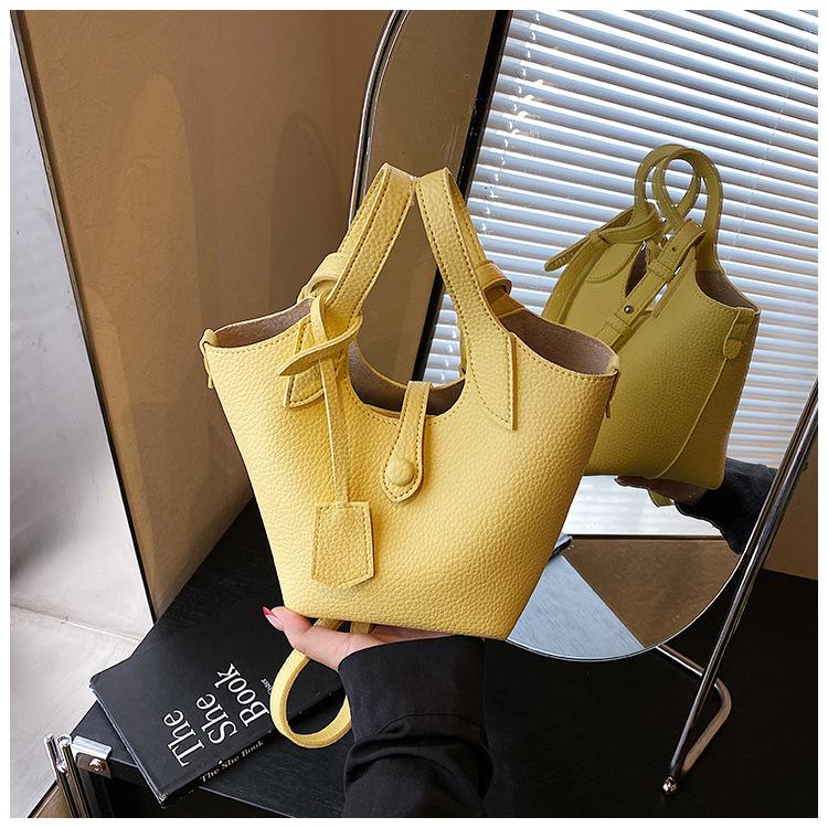 Wholesale 2025 new niche lychee pattern handbag bag women's Korean version simple bucket bag casual messenger bag