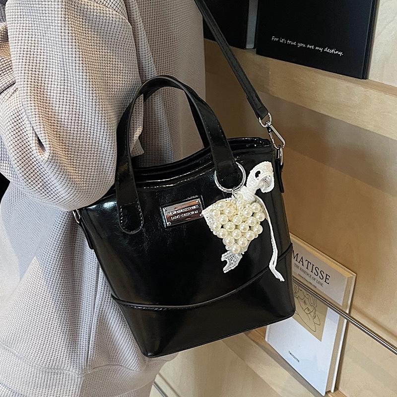 Koreańska wersja popularnej prostej wysokiej jakości koreańskiej przenośnej torby-wiadra modna wszechstronna styl commuter miejski casualowa torba listonoszka damska