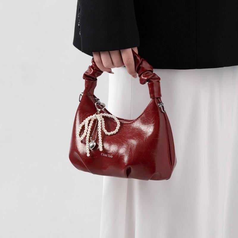 

Red Small Bag Women s 2025 New Summer Chain Messenger Bag Light Luxury Niche High Sense Portable Dumpling Bag Red delivery pendant