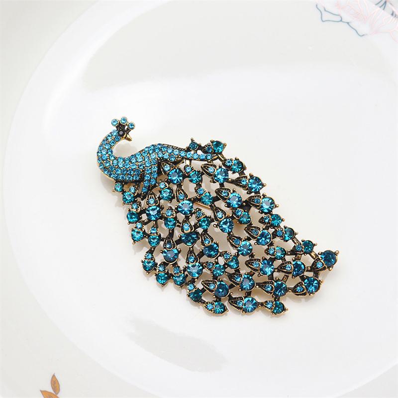 UILZ Exquisite Designer Peacock Zircon Brooch For Women Swan Shiny Crystal Lapel Pin Luxury Clothing Jewelry Accessories