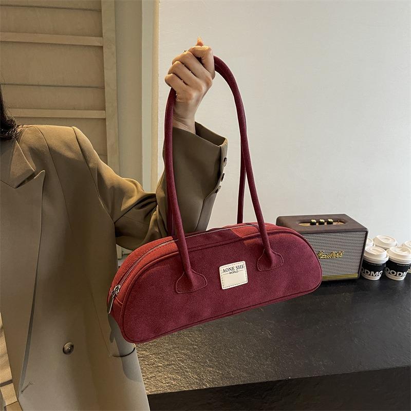 Niche retro matte underarm bag women's new bowling bag simple large-capacity portable commuter women's bag