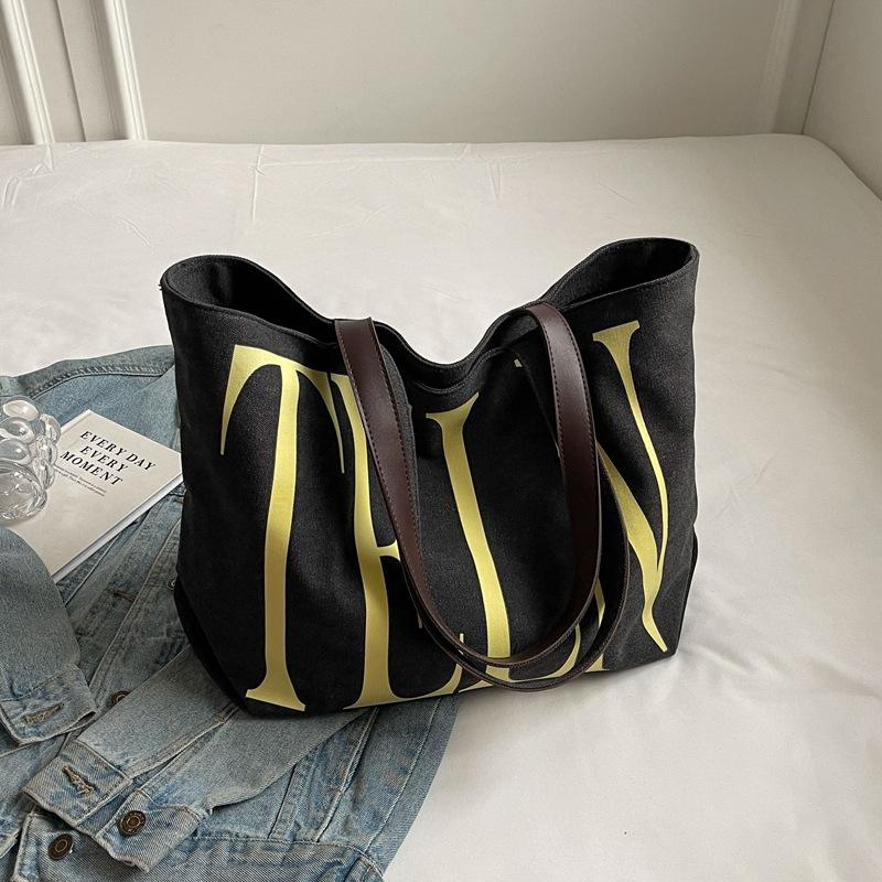 Fashion Korean version ins niche letter printed canvas bag 2025 new casual mommy shopping bag shoulder bag