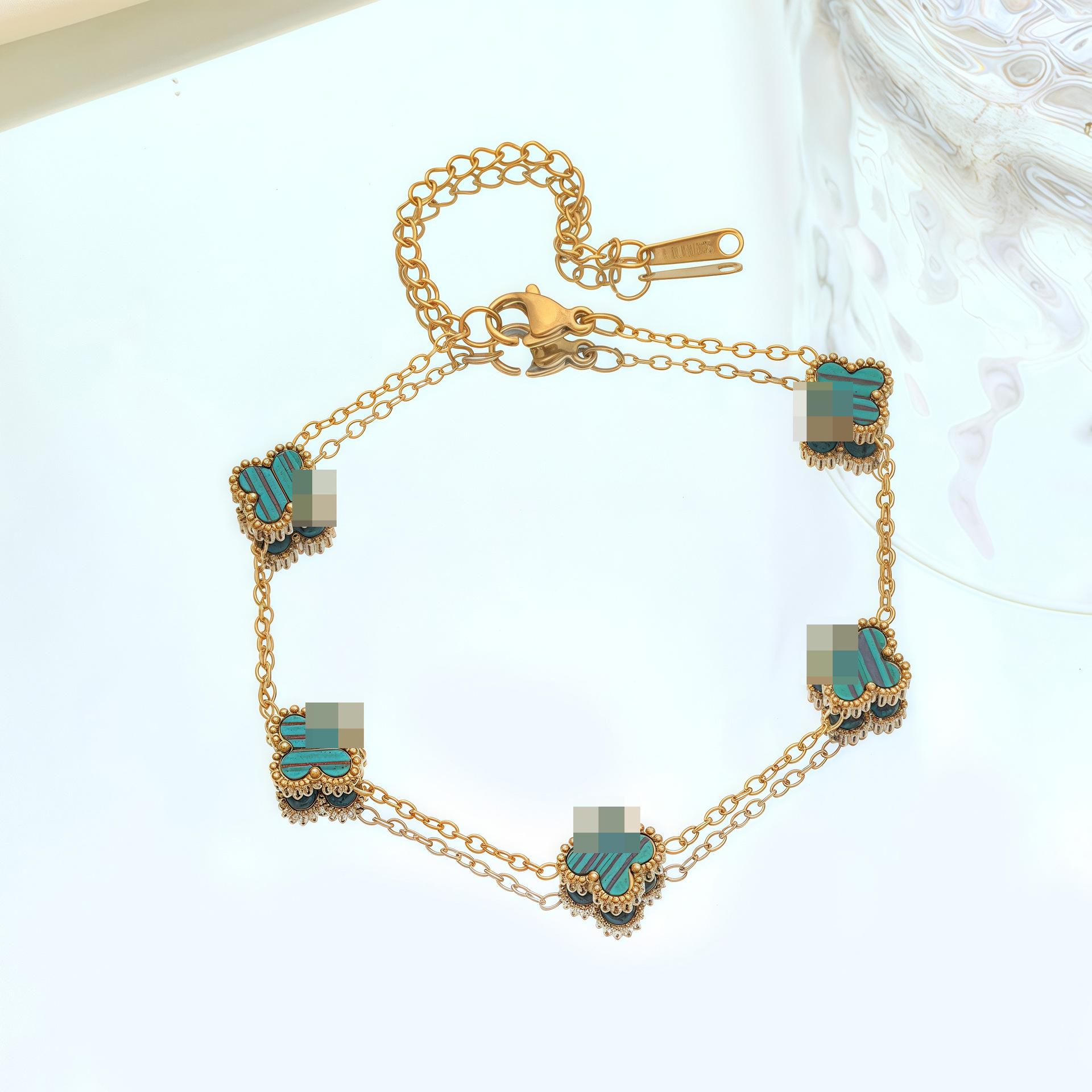 Двусторонний браслет из нержавеющей стали с четырехлистником для женщин