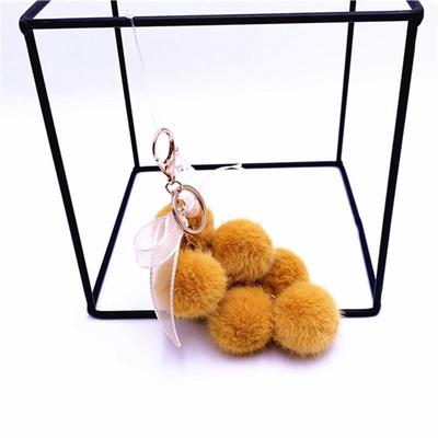 Carino Creativo Pompelmo Pizzo Fiocco Palla di Pelliccia Bambola Peluche Giocattolo Portachiavi Ciondolo Appeso alla Borsa Zaino Fascino Portachiavi Auto Regalo di Fine Anno