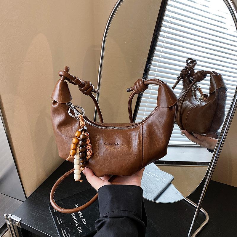 Premium retro dumpling bag women's new fashion casual shoulder messenger bag niche commuter bag