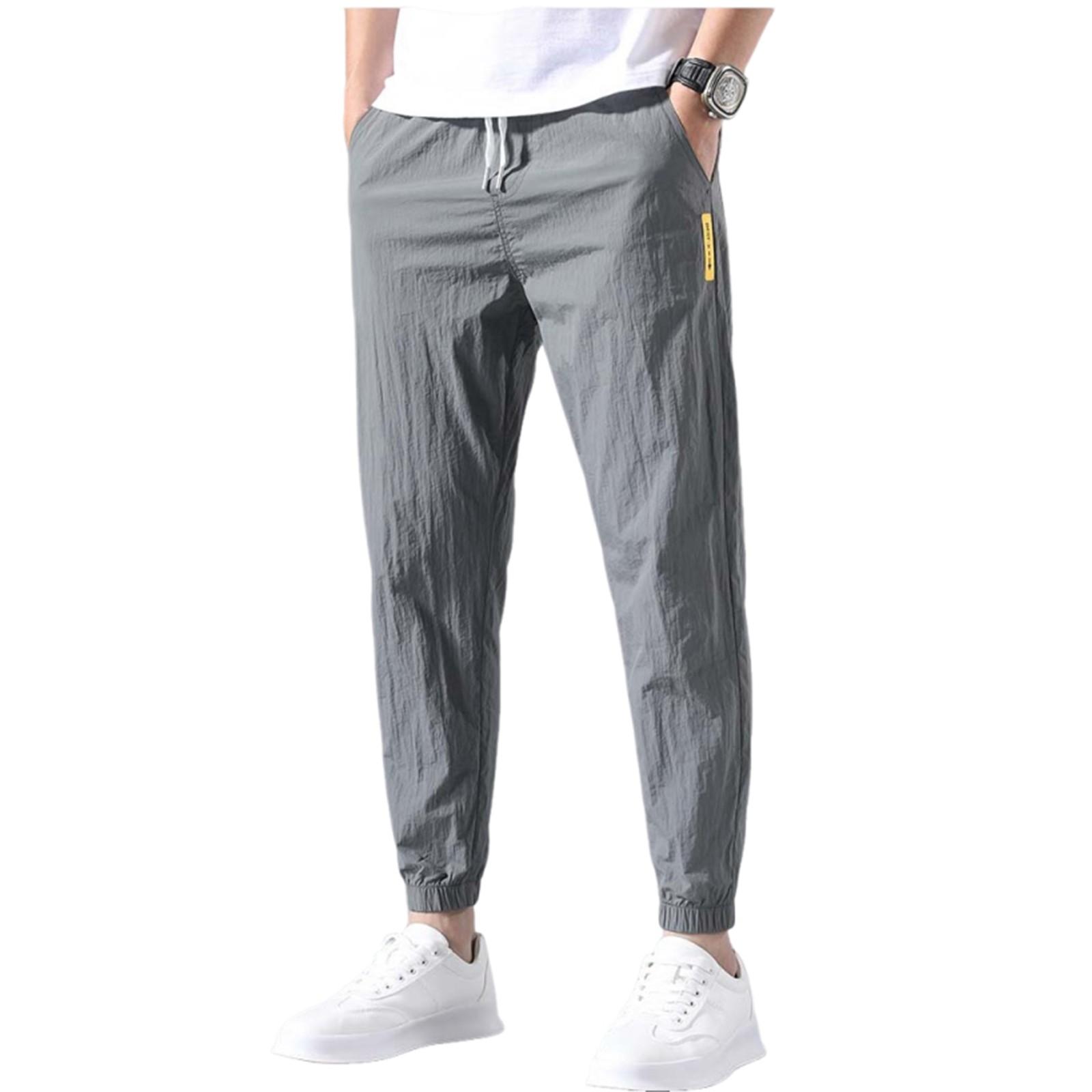 

Летние быстросохнущие брюки мужские узкие брюки мешковатые спортивные штаны корсетные брюки из девяти частей M