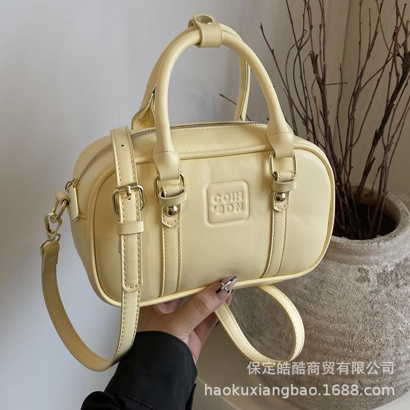 Korean version niche design fashionable versatile portable pillow bag women's 2025 summer new high-end Boston bag
