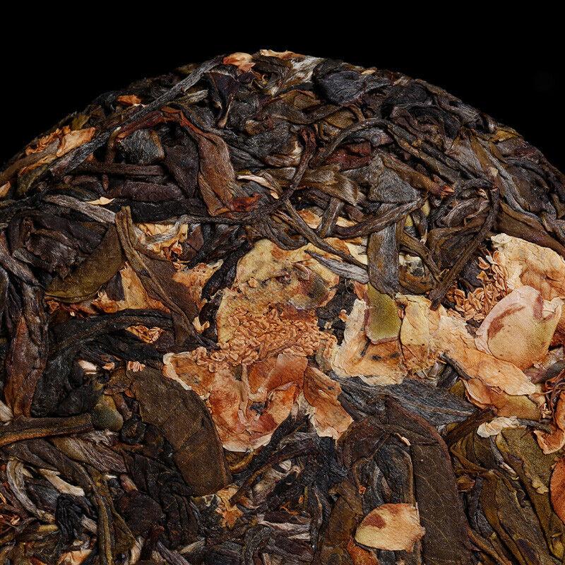 Discover 100g of Pu'er Raw Tea Plucked from Ancient Trees with Enchanting Floral Scent