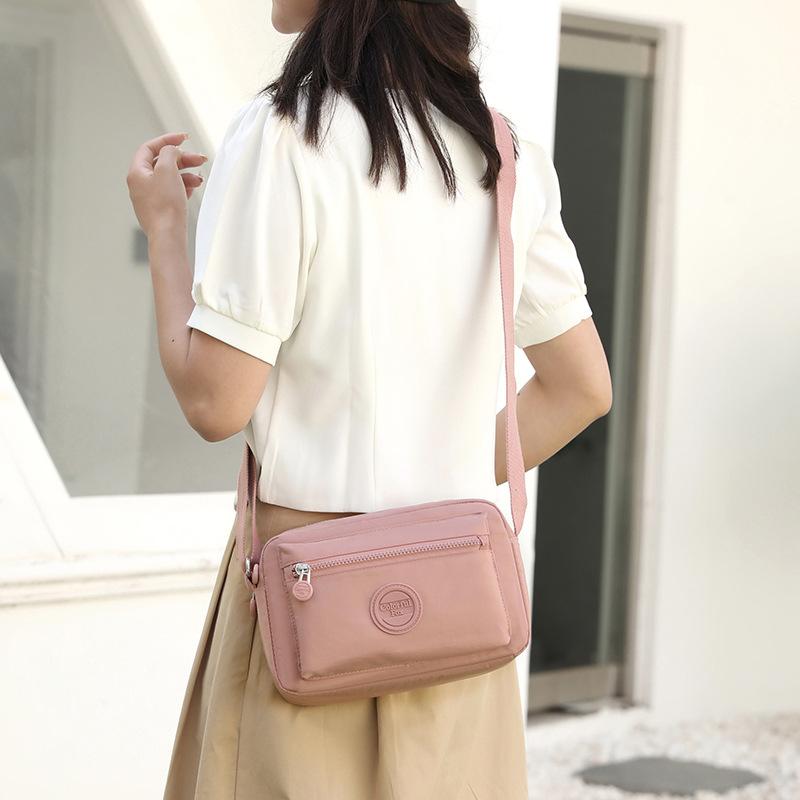 New Macaron shoulder bag women's fashion trend messenger bag multi-layer mobile phone bag