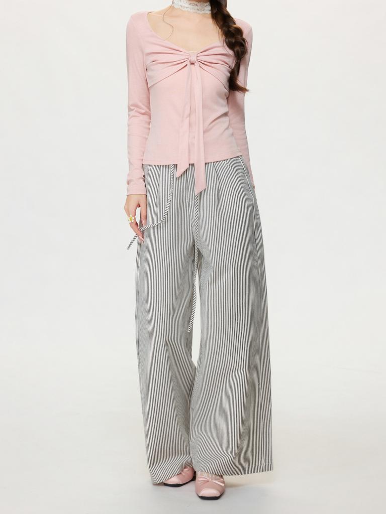 Pure Desire Pink Bow Design Sense V-neck Long-sleeved Knitted Sweater Women's Spring New Waist and Thin Temperament Top