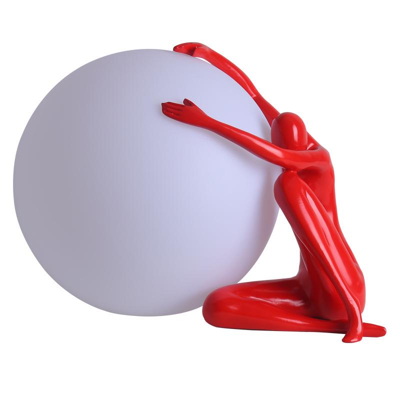 Modern Nordic Table Lamp Sculpture: Creative Doll Holding Luminous Ball for Bedroom and Living Room Decor