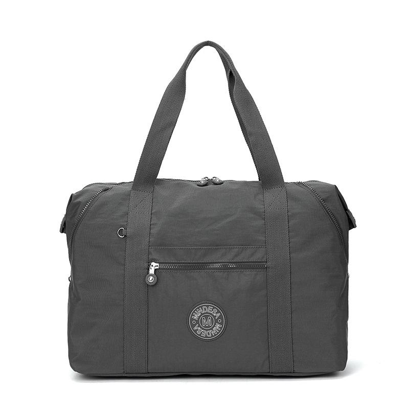 

2024 Модная легкая сумка через плечо унисекс из нейлона с защитой от брызг и совместимостью с чемоданом на колесиках 44x19x30cm