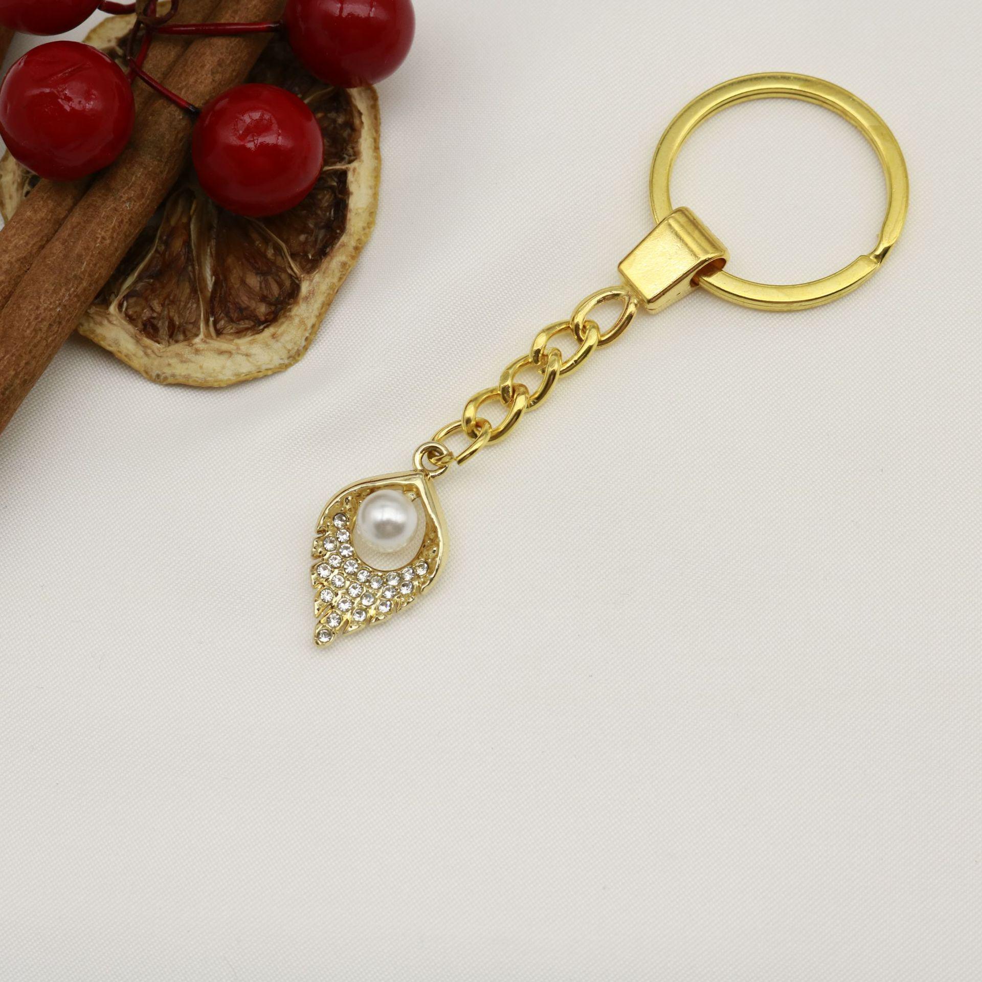 Elegant Water Drop Keychain Pendant золотой