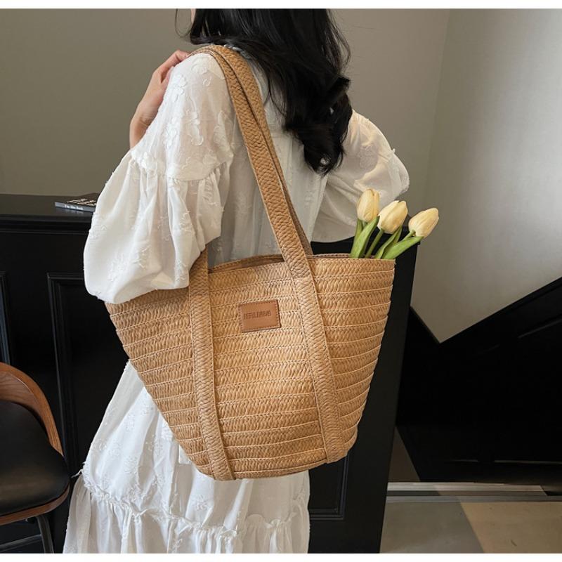 Neue Frühling- und Sommer-Mode lässige vielseitige gewebte Tasche große Kapazität Tragetasche Schulter Strohtasche