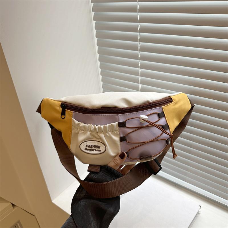 

Korean version of niche design messenger bag Japanese retro contrasting color casual breast bag women s and men s sports fanny pack фіолетовий