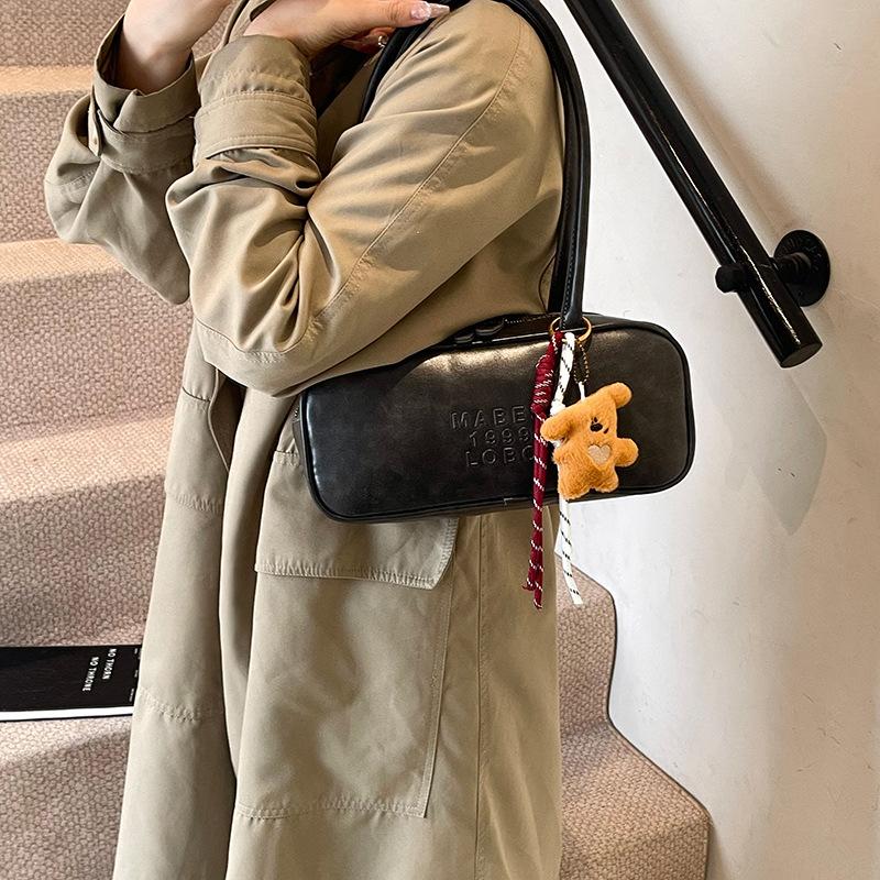 Autumn and Winter Retro Large-capacity Briefcase Women's 2025 New Super Hot Fashion Commuter Portable Bowling Bag