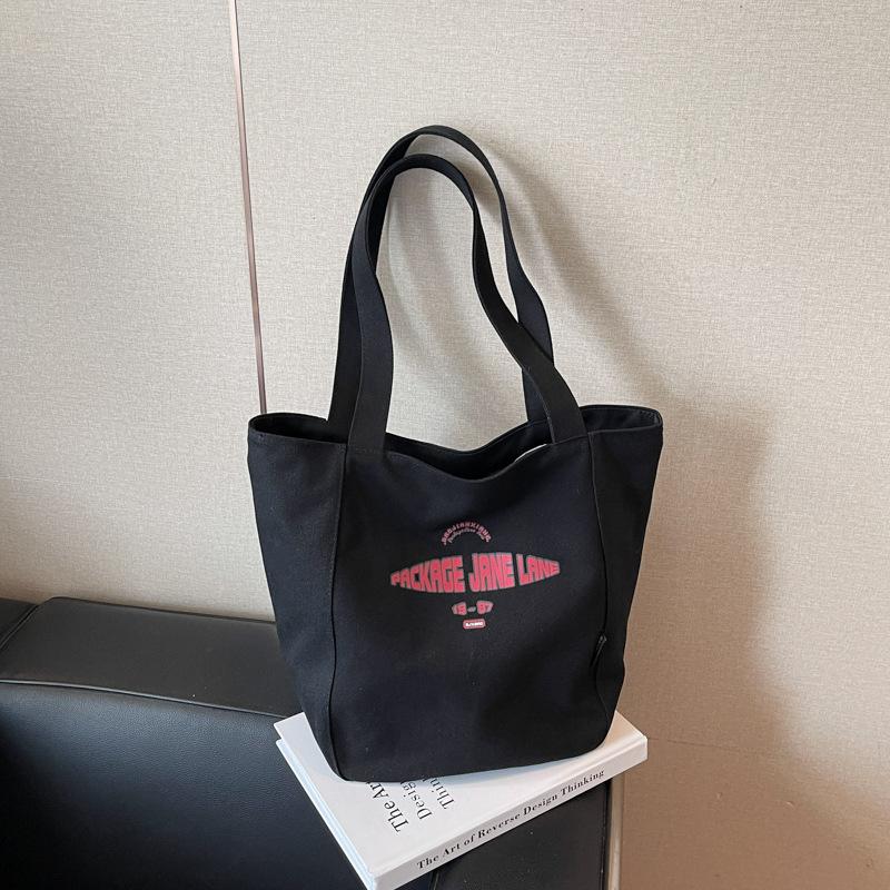 Niche Canvas Bag Women's Large-capacity New Casual Versatile Shoulder Bag Class Commuter Tote Bag