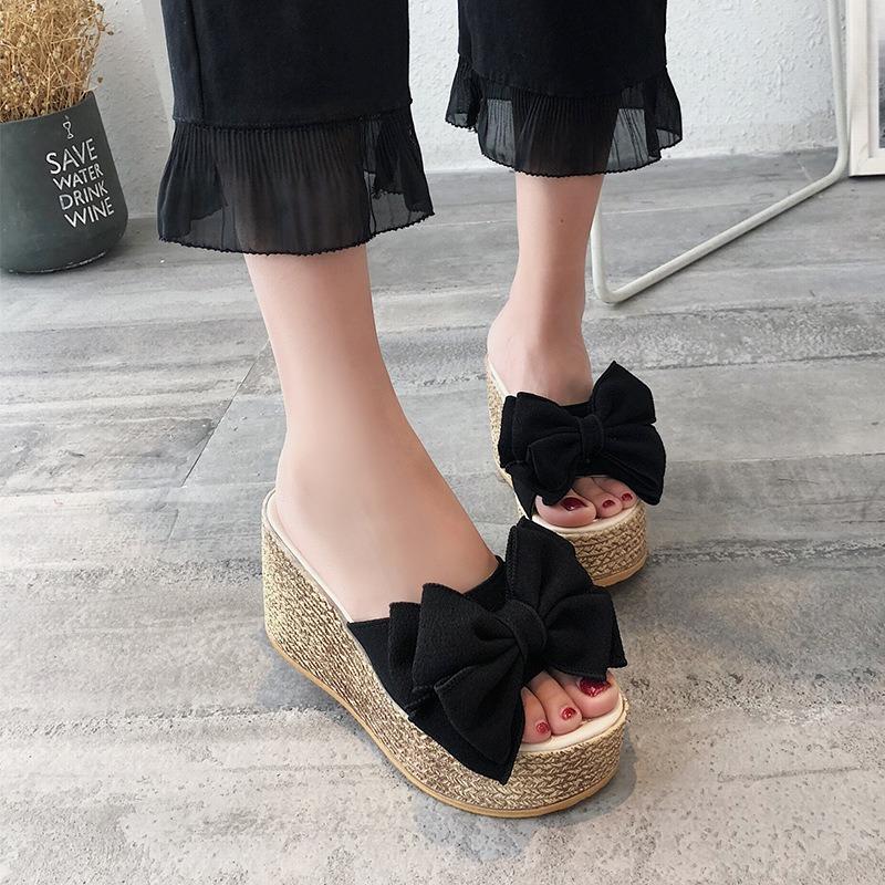 Slope heel sandals women's summer new bow one-word cool slippers women wear high-heeled beach slippers