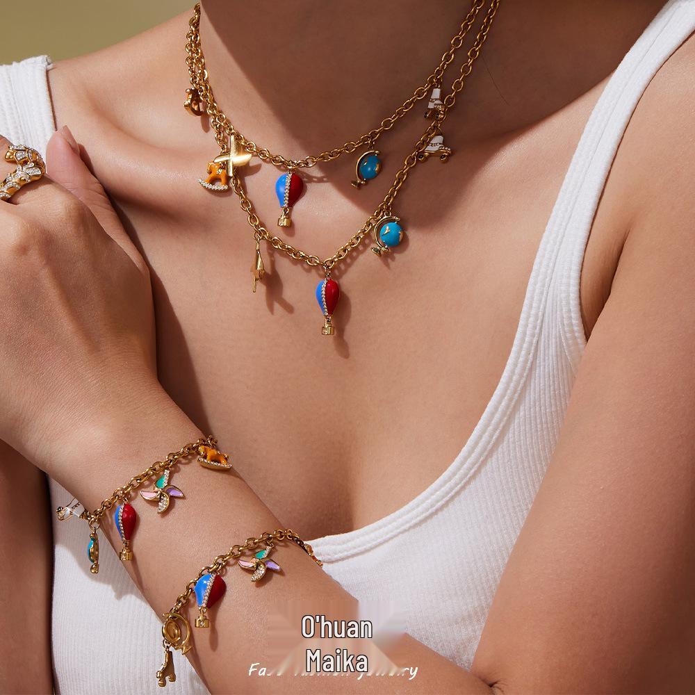 Oumaijia Stainless Steel Zircon Pendant Jewelry Set: Non-Fading Bracelet & Necklace