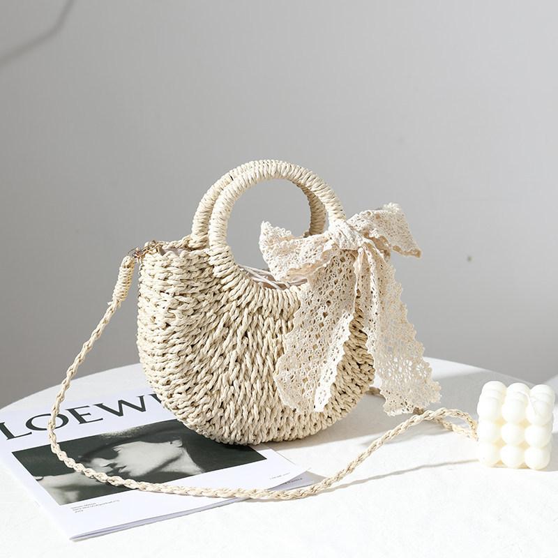 Summer woven bag women's niche design semi-round straw woven bag leisure vacation wind beach bag women's portable messenger bag