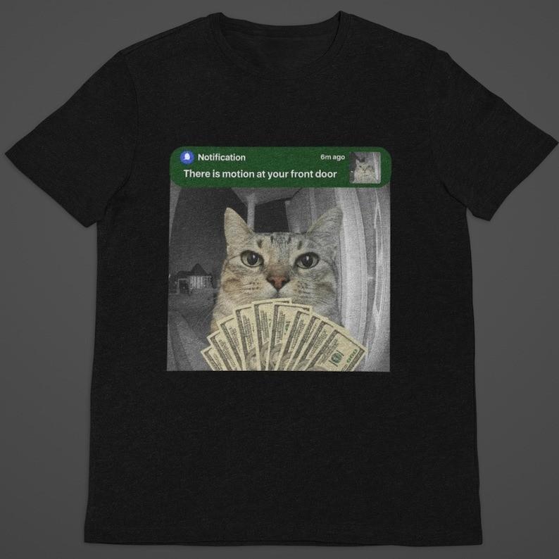 

Motion At Your Front Door Cat Shirt Cat With Money Meme Tee Viral Doorbell Cam Unisex T-Shirt XXXXL