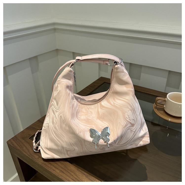 

Water-feeling ripple large-capacity bag women s 2025 new trend simple shoulder bag backpack tote bag розовый