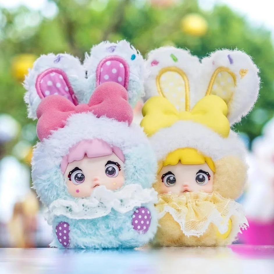 Nommi Plush Mascot Keychain Blind Box Fluffy Exterior Rigid Interior for Standing Includes 3 Rotating Perfect as a Bag Charm or Tabletop Decor 8 Types