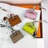 Chic Mini Bag Charm - Cute Earphone Pouch & Coin Purse with Car Keychain Decoration.