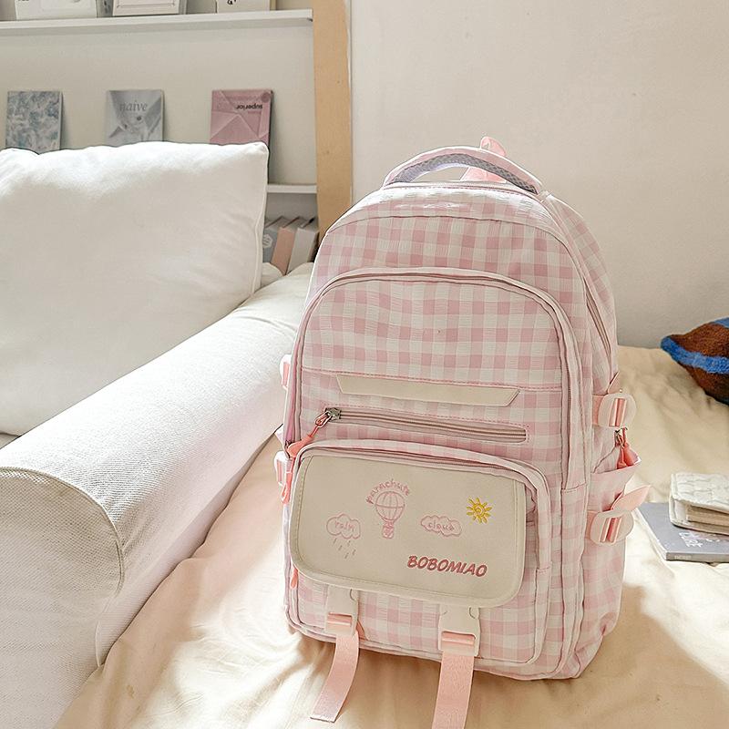 Sac à dos d'étudiante de lycée à carreaux rétro  Sac de cours grande capacité  Sac à dos .