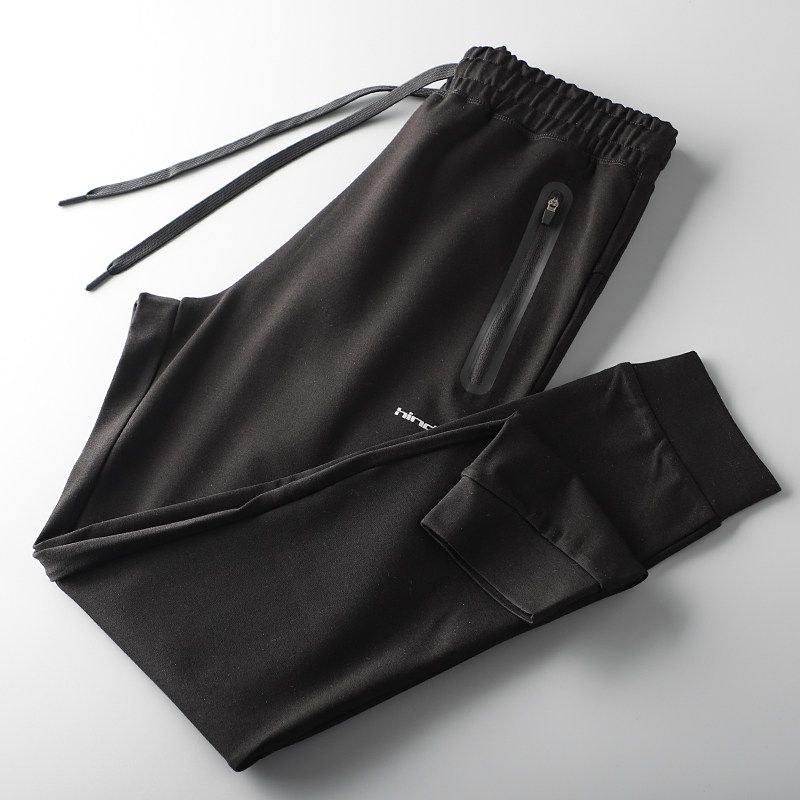 Pantalones de chándal casuales elásticos originales para exportación de productos ganaderos con corte de etiqueta
