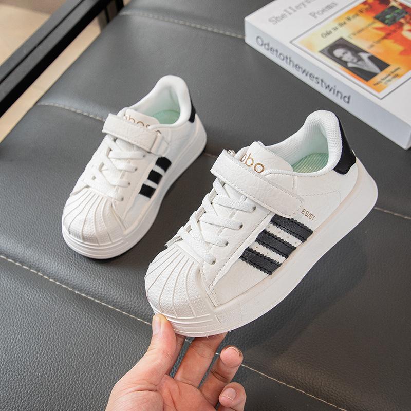 

Korean version of children s casual board shoes 2025 autumn new boys and girls shell head sneakers baby soft-soled shoes tide 26