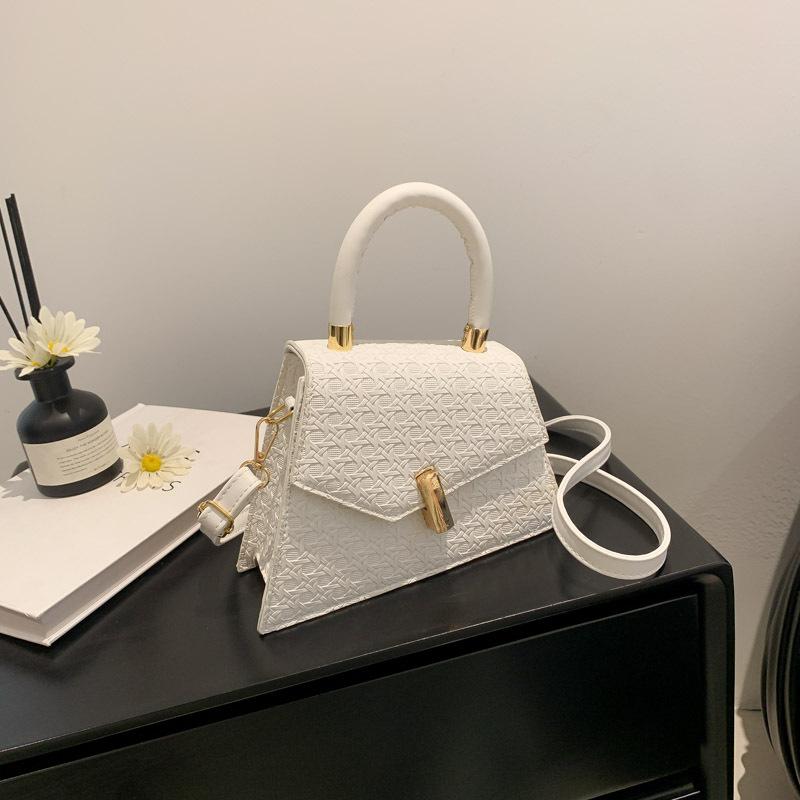 

Текстура модная женская сумка для переноски в руке, нишевый дизайн, 2024, новая летняя сумка-мессенджер, иностранный стиль, ретро, простая сумка через плечо белый